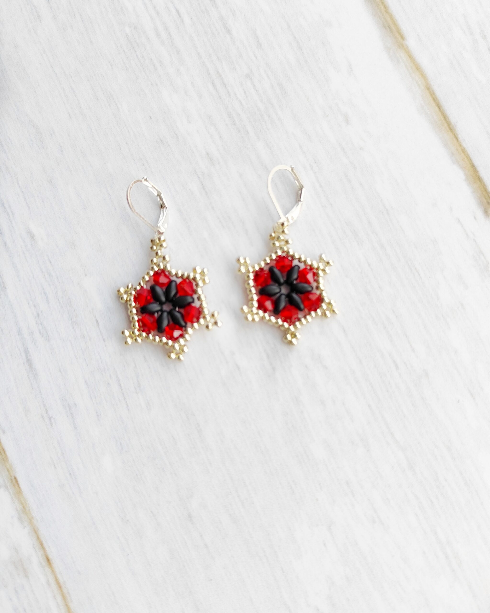 Aros Estrella Floral Negro