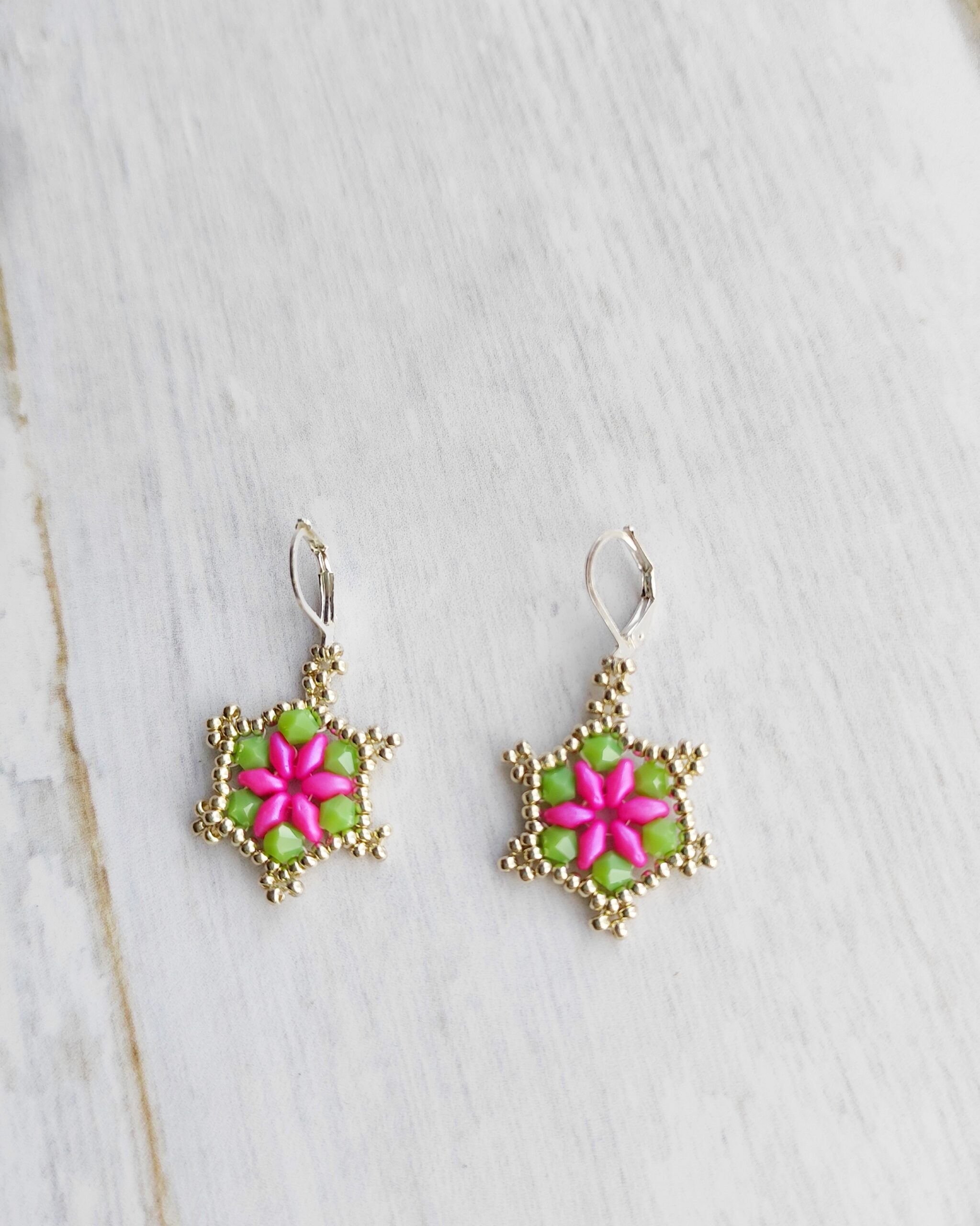 Aros Estrella Floral Fucsia